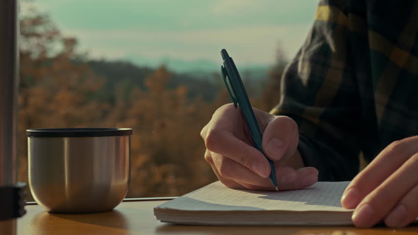 Tourist backpack, tourist woman emotionally Writes goals and plans in a diary against the backdrop of mountains and forests In the mountains. Fitness woman Morally rests from routine, winner
 Royalty-Free Stock Footage #1105913991