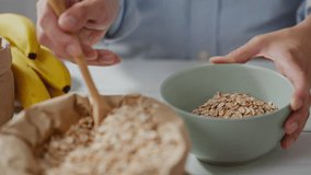 Bowl, woman beautiful healthy eating smart diet in light bright kitchen. Close-up fashionable young woman following the right diet applies new weight loss methods, grain
 - Powered by Shutterstock - Get 15% off with code: PIKWIZARD15