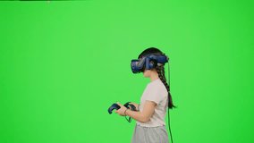 The little girl design artist VR headset creation 3d virtual reality world. Child in cyberspace get immersive experience on chroma key green screen. Concept VR immersive experience in virtual reality