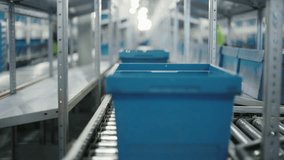 Parcels Progressing Along a Conveyor Belt System. Plastic Boxes Filled with Products Advancing on the Roller Conveyor. Representation of Packaging Service and Parcel Transportation Concept - Powered by Shutterstock - Get 15% off with code: PIKWIZARD15