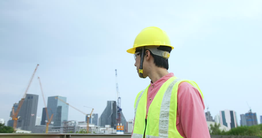 Civil engineering  watching the Blue Print in digital tablet