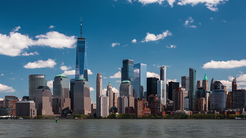 Timelapse of Lower Manhattan, New York City World Trade Center during a beautiful cloudy day, as seen from Liberty State Park, NJ Royalty-Free Stock Footage #1105921655