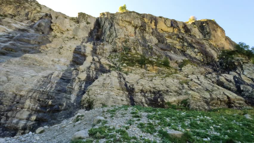 big cute high land water fall in Arkhyz mountain ridge at summertime