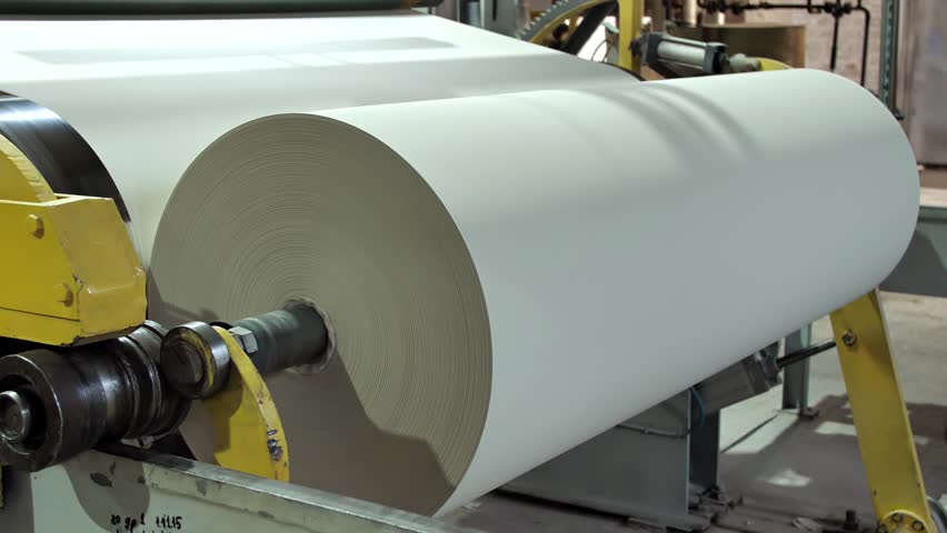 Factory for the production of paper rolls for hygiene. Manufacture of paper towels and toilet paper. Roll winding machine. Royalty-Free Stock Footage #1105925995