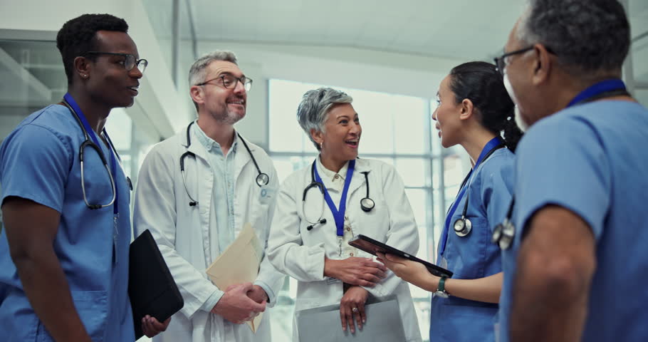 Doctor, high five and meeting in healthcare for team building, collaboration or winning at the hospital. Happy group of people or medical professional in celebration for teamwork success at clinic Royalty-Free Stock Footage #1105934333