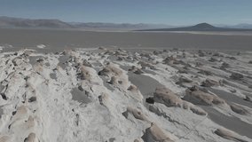 Drone footage of Campo de Piedra Pomez - a bizarre but beautiful landscape in the Argentinian highlands with a huge field of pumice, volcanic rocks and dunes of sand in the Puna - raw version