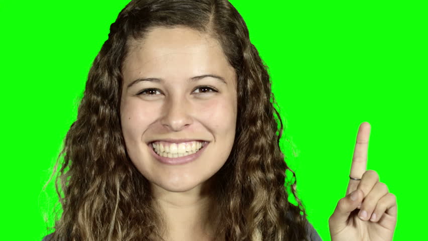 Cute, vivacious girl smiles, wags her finger, has a bright idea, then waves her finger again. Green screen.
