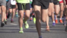Defocused marathon runners in slow motion 180fps