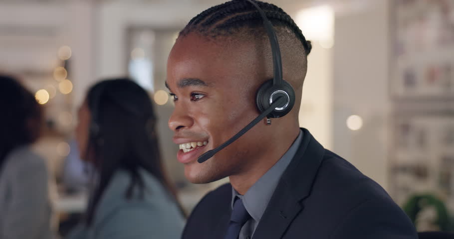 Talking, face and a man with a call center headset for customer service, sales or advice. Happy african male consultant profile for telemarketing, telecom or crm and technical support at help desk