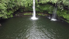 The amazing drone view of Duwur Waterfall in Purbalingga, Central Java, Indonesia. This aerial video was taken on September 18, 2021 by a professional. This video contains view of a tropical waterfall