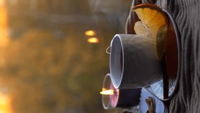 Hot water pouring cup with tea bag on cozy home autumn background. Having cup of tea near the window. Vertical video - Powered by Shutterstock - Get 15% off with code: PIKWIZARD15