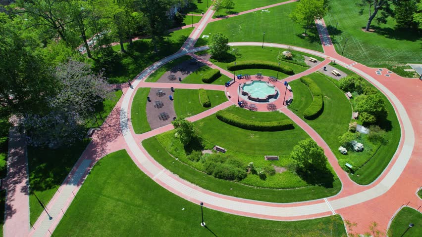 University of Delaware drone shot of campus green fountain