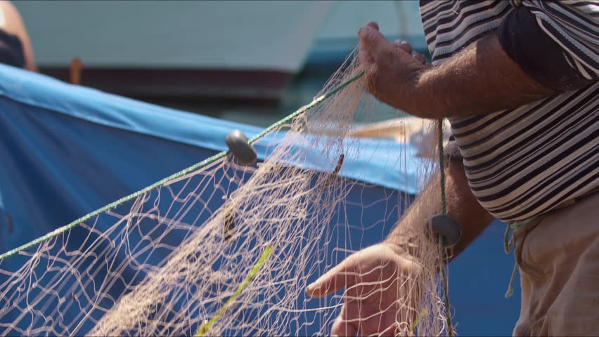 Old Fisherman Prepare Hand Pulling the Fish Net Footage. Royalty-Free Stock Footage #1105980321