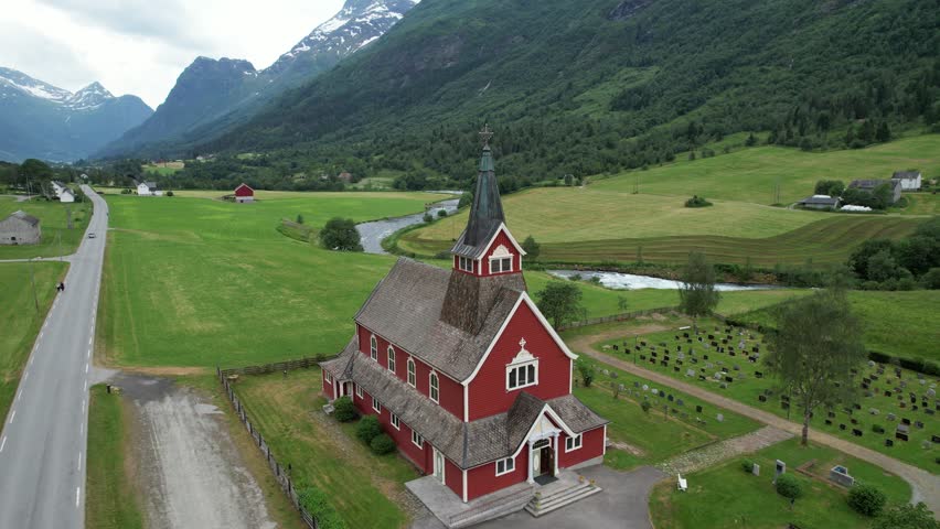 Aerial video of Olden church, Norway: Olden kyrkje, inside Oldedalen river valley, Norway
