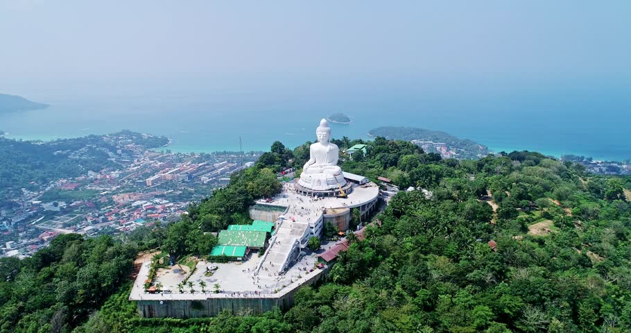White Marble Big Buddha Statue Temple, Close Up Aerial View big buddha on top of mountains at Phuket Thailand Royalty-Free Stock Footage #1105995431