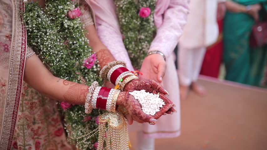 A shot of an Indian Wedding where rituals are being performed at New Delhi, India
 Royalty-Free Stock Footage #1105996193