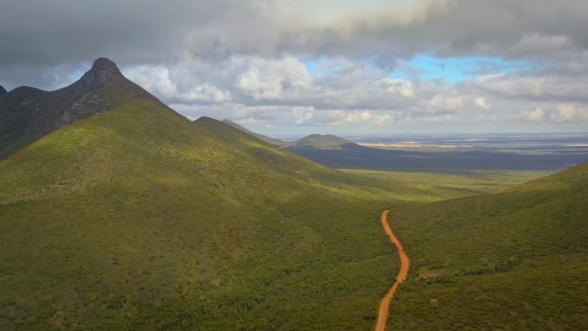 Stirling Range or Koikyennuruff landscape scenery, beautiful mountain National Park in Western Australia, with the highest peak Bluff Knoll. Road to and view from the rocky mountains.