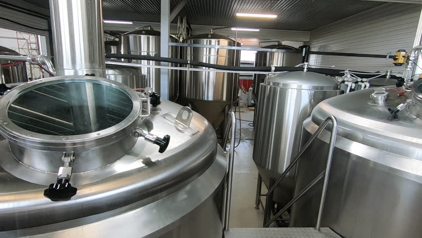 Beer production. Stainless steel containers for brewing beer. automated process.