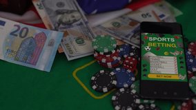 Smartphone with poket table on screen, playing cards and chip cards on poker table. Online casino. - Powered by Shutterstock - Get 15% off with code: PIKWIZARD15