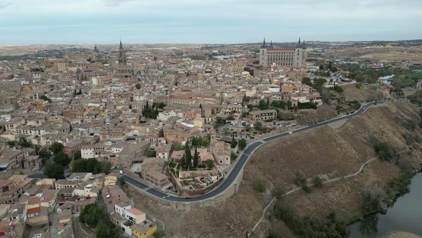 Aerial view of Toledo in Spain. Drone perspective of the city, the cathedral and the Alcazar.