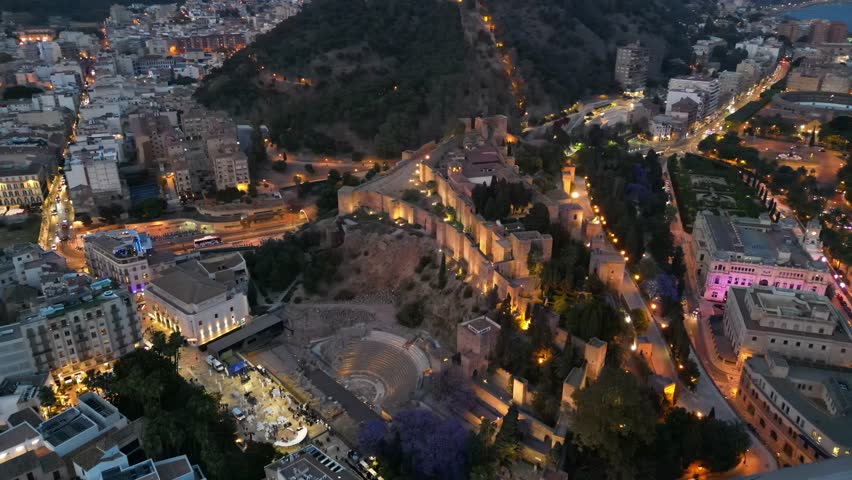 Alcazaba fortification and Roman theatre at night, Malaga, Andalusia, Spain