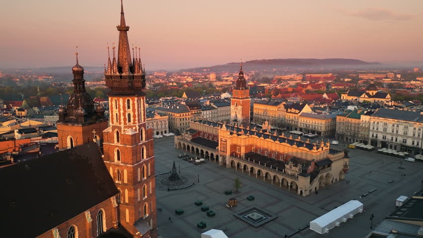 krakow city old town aerial view drone at sunrise,flying over saint mary basilica market square