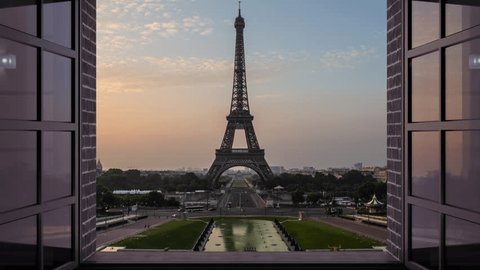window opens on paris city eiffel tower timelapse from night to day at sunrise,view from inside the room Stockvideó