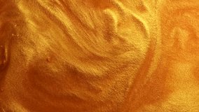 Liquid gold moving, golden abstract background. Flowing Golden abstract backdrop. Beautiful metallic yellow texture, swirls. Liquid Gold metallic paint close-up. Art Wallpaper waves.  - Powered by Shutterstock - Get 15% off with code: PIKWIZARD15