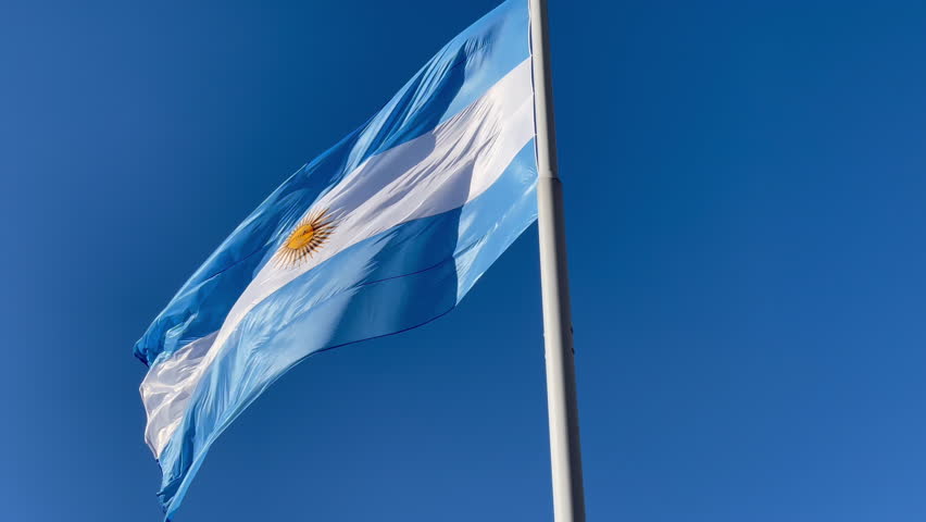 Flag of Argentina Against Blue Sky at the Casa Rosada (May Square), Buenos Aires, Argentina. 