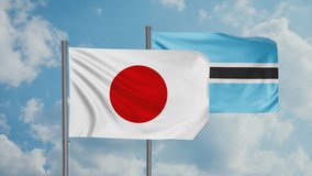 Botswana flag and Japan flag waving together on blue sky, looped video, two country cooperation concept