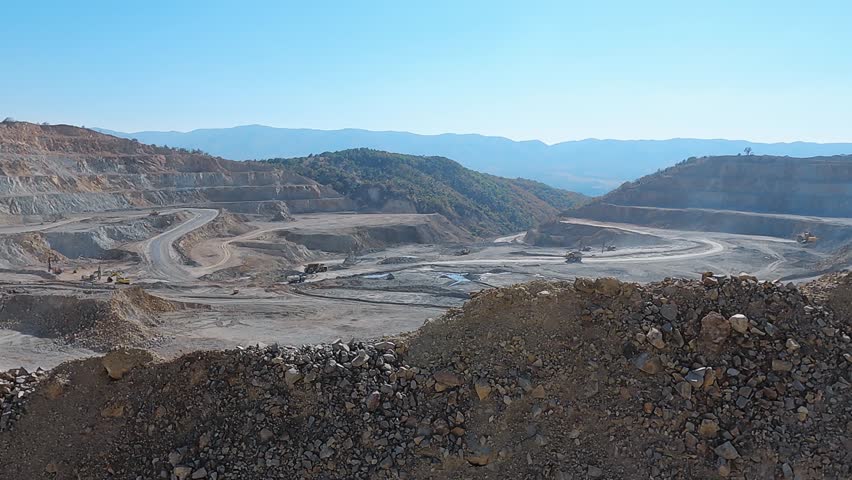 Pov transportation in dumper truck in an open pit for gold mining