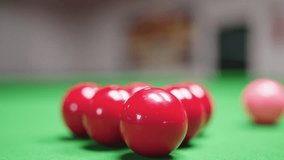 Close up of Snooker shooting on snooker table and balls in slow motion