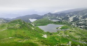Seven Rila lakes and waterfalls in nature of mountain range, aerial view, hiking, trekking and tourism in Bulgaria 