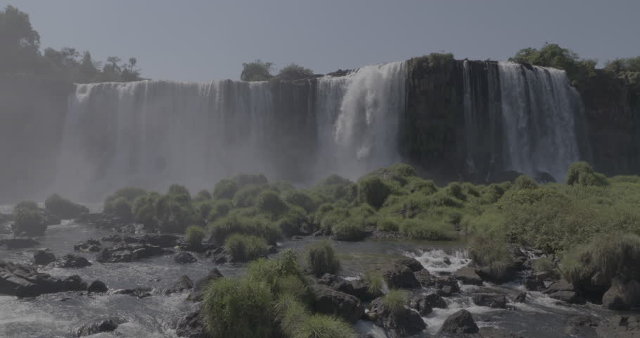 Foz do Iguaçu Paraná Brazil - 03 17 2020: view of the Iguaçu Falls with sparkling water, green vegetation, and lots of beauty. Collection view 01 of 12. The natural heritage of humanity. Royalty-Free Stock Footage #1106049893