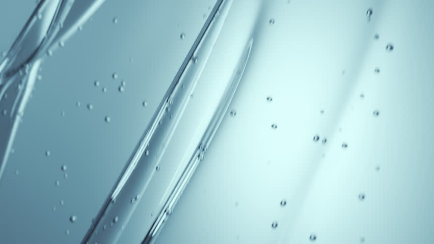 Glycerin gel flow texture. Blue serum toner. Liquid gel moisturizer with bubbles macro. Clear cosmetic cream or face serum. Abstract background for cosmetics commercial product