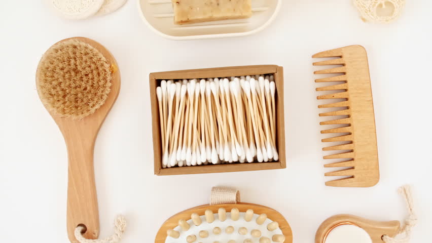 Natural skin care products. Zero waste, eco friendly bathroom and spa accessories. Personal care supplies: wooden comb, brush, toothbrush, soap in handmade. Beauty SPA branding mockup.