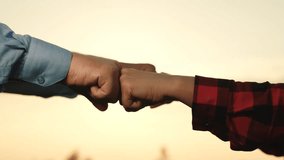 brotherhood friendship symbol agreement, punching fists to make deal business, teamwork group people, friendship sign agreement agreement deal, joint business, beat fists against sky, hand fist - Powered by Shutterstock - Get 15% off with code: PIKWIZARD15