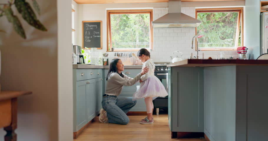 Ballet, girl and talking to mom in a kitchen together for support and motivation for dancer, ballerina or confidence. Tutu, skirt and hug from mother with love, bonding or pride in child in home Royalty-Free Stock Footage #1106062301