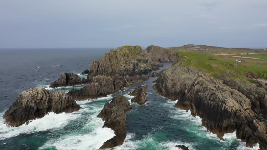 Aerial view of the coastline at Malin Head in Ireland. Royalty-Free Stock Footage #1106067663