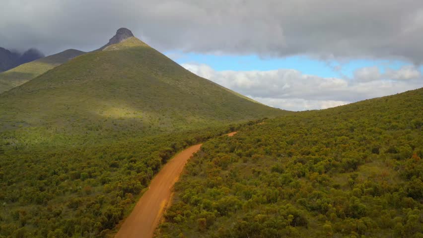 Stirling Range or Koikyennuruff landscape scenery, beautiful mountain National Park in Western Australia, with the highest peak Bluff Knoll. Road to and view from the rocky mountains.