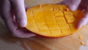 Sweet and delicious mango. Video of diamond cutting.