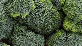 green fresh broccoli vegetables, rotation in circle. broccoli inflorescence Turning. selective focus	 - Powered by Shutterstock - Get 15% off with code: PIKWIZARD15