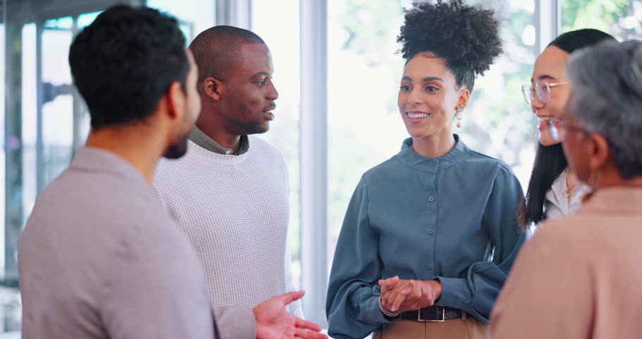 Handshake, introduction and business people meeting in a corporate company corridor as a team in partnership. Welcome, teamwork and employees talking and networking together in discussion