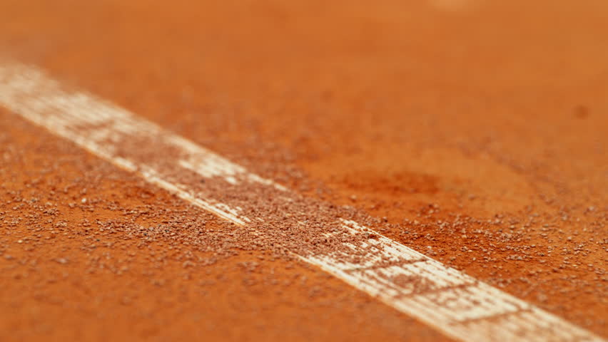 Super slow motion of Tennis ball ping on clay court inside or outside white line. Filmed on high speed cinematic camera at 1000 fps. Royalty-Free Stock Footage #1106092019