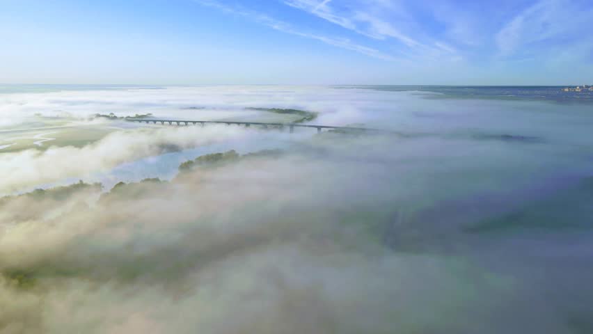 Aerial view of the landscape river bridge fog