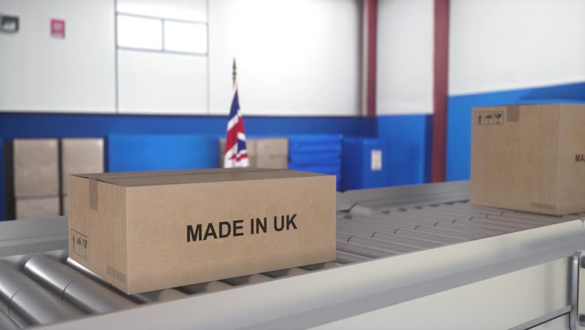 Made in UK import and export concept. Cardboard boxes with product from United Kingdom on the roller conveyor | Shutterstock HD Video #1106102759