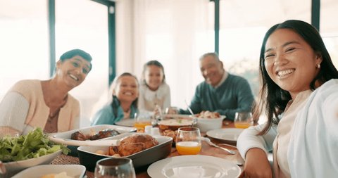 Thanksgiving selfie with children, parents and grandparents together as a family for bonding in celebration. Love, brunch and portrait of kids and relatives at the dining room table for a picture Video de stock