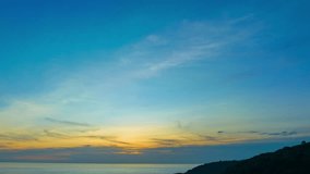 aerial hyper lapse view scenery sweet yellow light in blue sunset above the ocean.
sweet gradient sky of sunset over Karon beach.The vast sky is empty. abstract nature background, 
Sky texture 