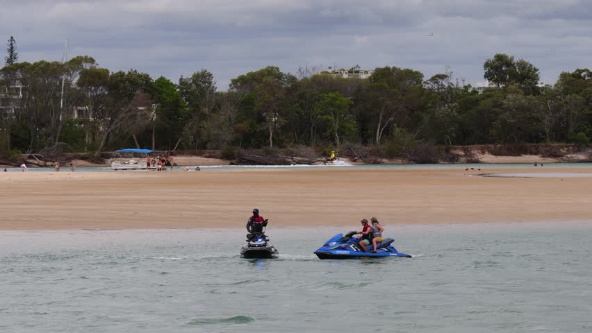 Officer on Water Police Jetski at Work, Noosa Beach, Australia