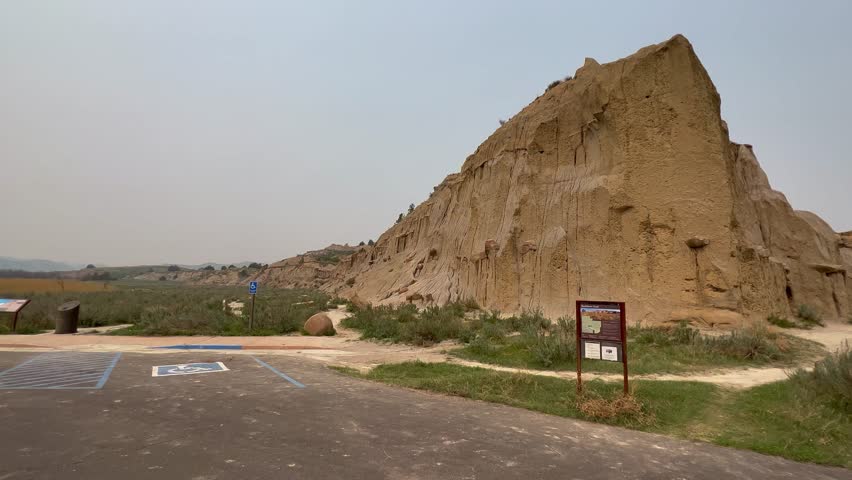 Panning Left on the badlands hills and mountains in the Cannonballs area in the North Unit in  Theodore Roosevelt National Park in North Dakota.